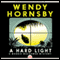 A Hard Light: A Maggie MacGowen Mystery, Book 5 (Unabridged) audio book by Wendy Hornsby